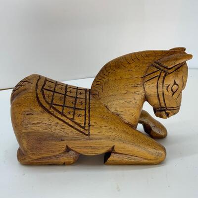 Wood horse with secret compartment