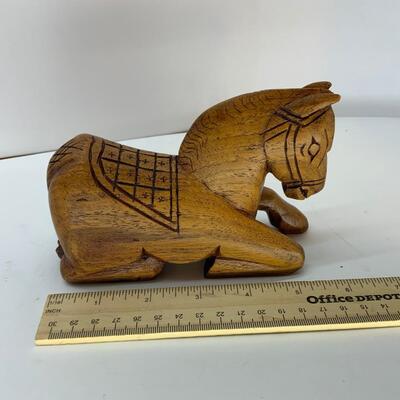 Wood horse with secret compartment