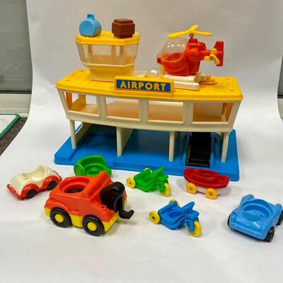 Vintage Fisher Price Little People Airport and Vehicle Lot | EstateSales.org