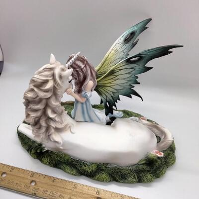 Lot 6 - Unicorn and Fairy Figurine