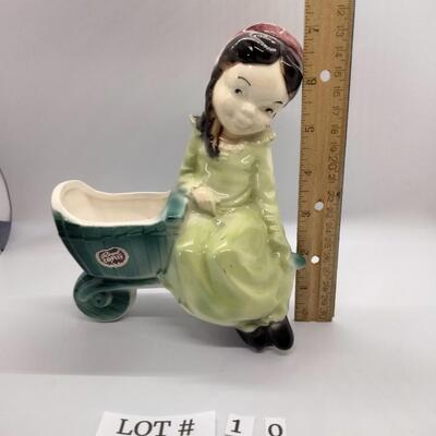 Lot 10 - Royal Copley Girl with Wheelbarrow planter