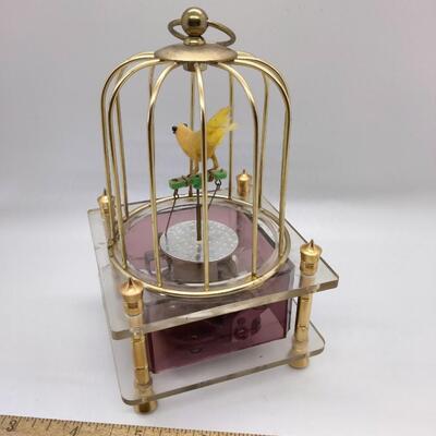 Lot 25 - Vintage wind up music box bird in a cage