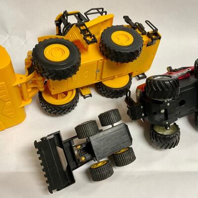 Three Piece Lot of Construction Vehicles Bulldozers Monster Truck
