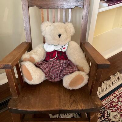 Child’s wooden rocking chair with bear
