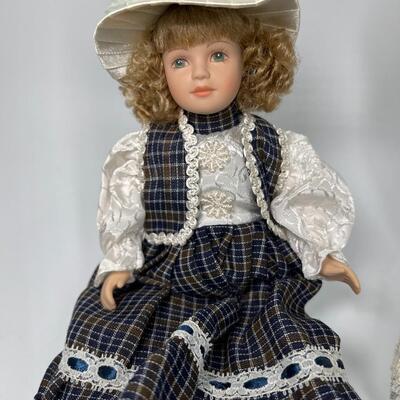 Pair of 9" Porcelain Dolls