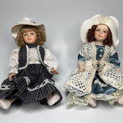 Pair of 9" Porcelain Dolls