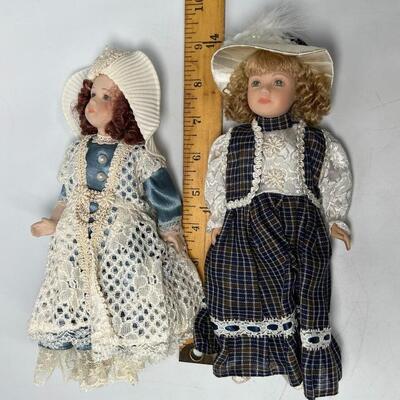 Pair of 9" Porcelain Dolls
