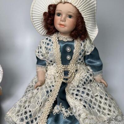 Pair of 9" Porcelain Dolls