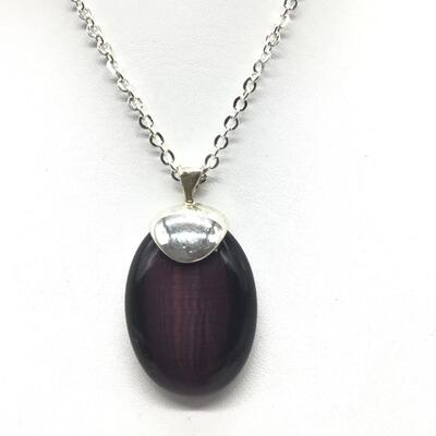 Silver tone necklace with purple stone pendant