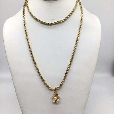 Vintage gold tone necklace with Roman marked pendant