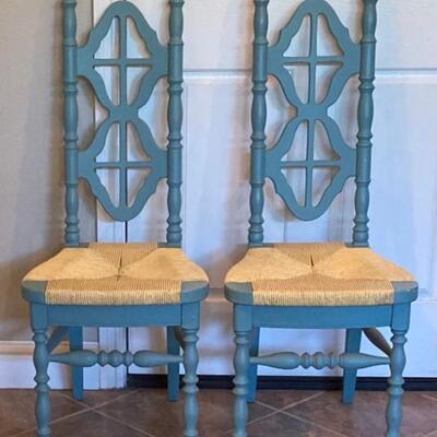 Two Blue Chairs With Woven Seats