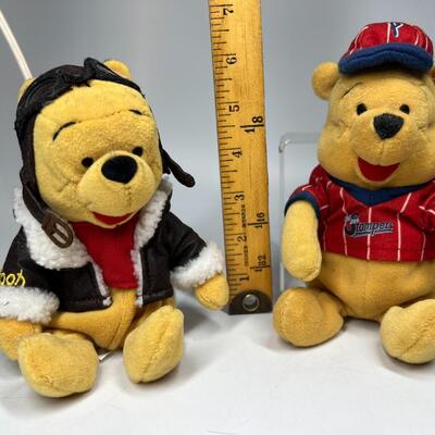 Pair of Disney Mouseketoys Aviator Flight Jacket & Baseball League Jersey Winnie the Pooh Stuffed Plushies