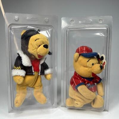 Pair of Disney Mouseketoys Aviator Flight Jacket & Baseball League Jersey Winnie the Pooh Stuffed Plushies