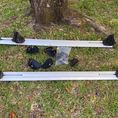 Cross bar adjustable rails for luggage cargo carrier