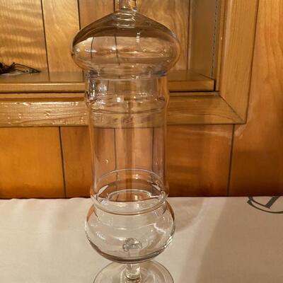 Tall glass apothecary jar on pedestal with lid