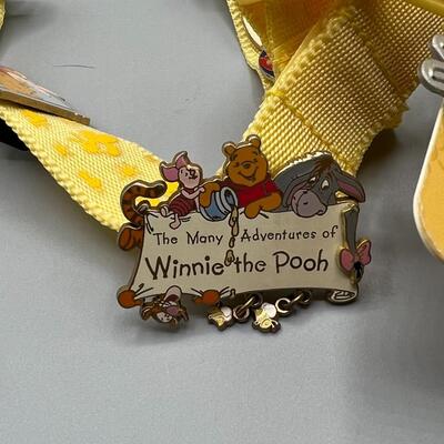 Disneyland Pin Trading Lanyard with Collectible Winnie the Pooh Themed Pins