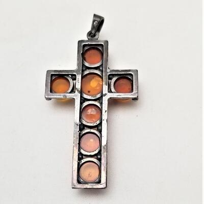 Lot #1  Cabochon Amber Cross set in Sterling