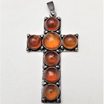 Lot #1  Cabochon Amber Cross set in Sterling