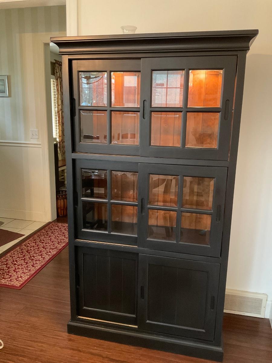 Black Lighted curio with sliding doors