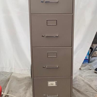 243. Four Drawer Metal File Cabinet