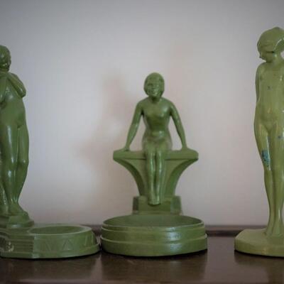 GROUPING OF THREE 1930'S FEMALE NUDE FIGURINES. ONE STAMPED FRANKART.