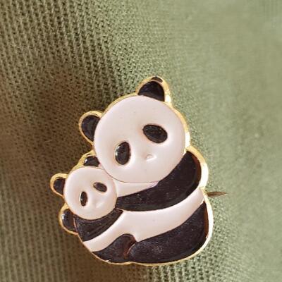 Vintage green hat or cap with pins