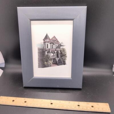 Lot 124 - colroful print victorian home framed