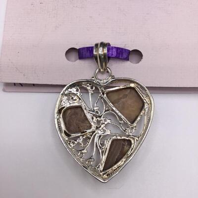 LOTJ139: Honey-Brown Rhodochrosite in Heart-Shaped Silver Pendant