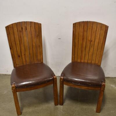 2 Brown Wooden Side Chairs with Brown Vinyl Cushioned Seats
