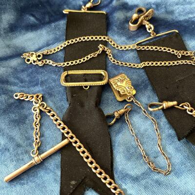 LOT 103  GROUP OF VICTORIAN WATCH CHAINS & MOURNING RIBBON FOBS
