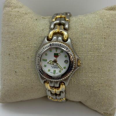 LOT:9: Woman’s  Swiss made KG Heuer Water Resistant Watch Gold & Silver Tone