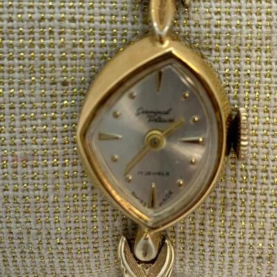 LOT:13: Antique Germinal Voltaire 17 Jewel Lady’S Gold-tone stretch band Wristwatch