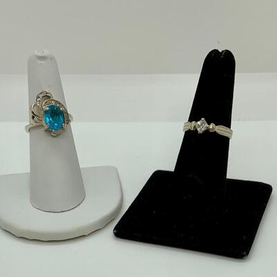 LOT:41: 2 Sterling Silver Rings One Blue Topaz, one Simulated Diamond