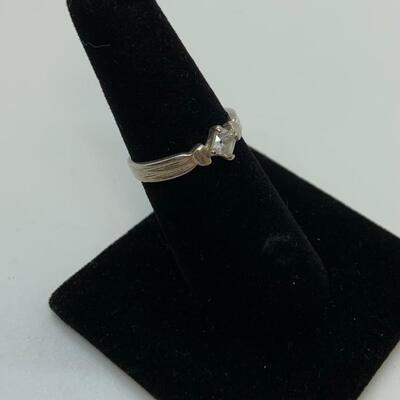 LOT:41: 2 Sterling Silver Rings One Blue Topaz, one Simulated Diamond