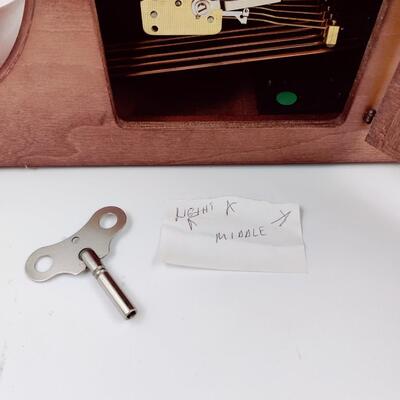 HOWARD MILLER MANTEL CLOCK W/ KEY