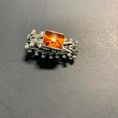 Silver and amber ring
