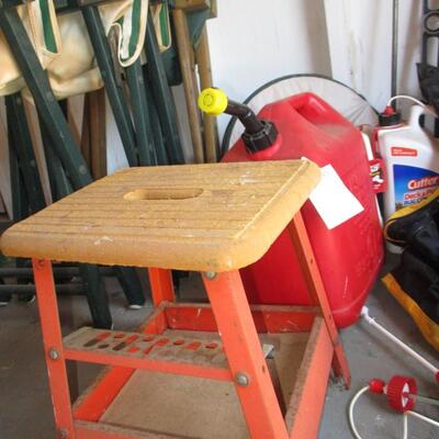 Gas jugs, shop stool, chemicals