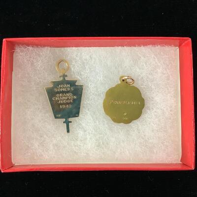 1006 Two 10kt PA. State Block & Bridle Charms