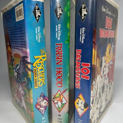 Retro Lot of Walt Disney Classic VHS Movies Robin Hood, 101 Dalmatians, & More