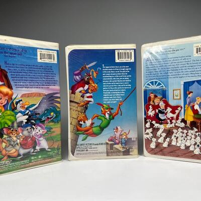 Retro Lot of Walt Disney Classic VHS Movies Robin Hood, 101 Dalmatians, & More