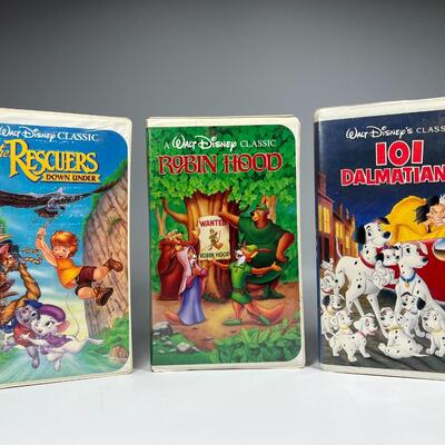 Retro Lot of Walt Disney Classic VHS Movies Robin Hood, 101 Dalmatians, & More