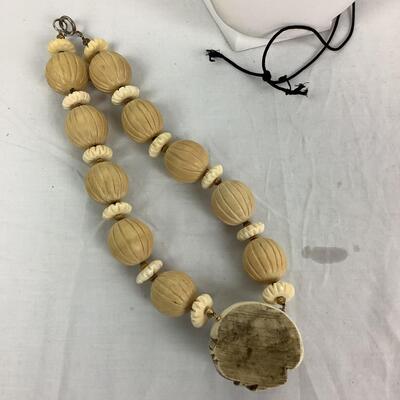 1028 Faux Netsuke Necklace with Bone Carved Necklace