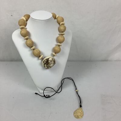 1028 Faux Netsuke Necklace with Bone Carved Necklace