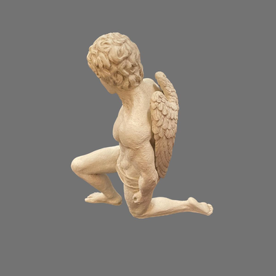 Large Kneeling Cupid Statue on Display Board