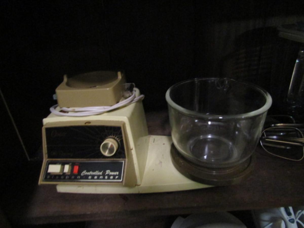 Vintage Oster Kitchen Center Includes One Bowl and Several Attachments
