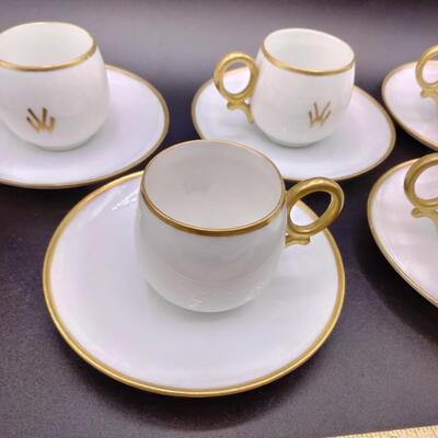 9 - 5 antique demitasse cup and saucers