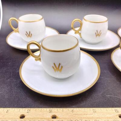 9 - 5 antique demitasse cup and saucers