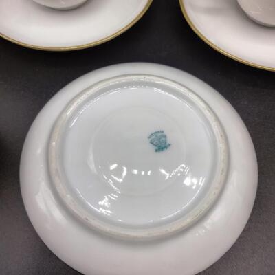 9 - 5 antique demitasse cup and saucers