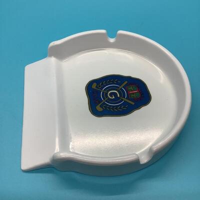 G Club with golf clubs ashtray