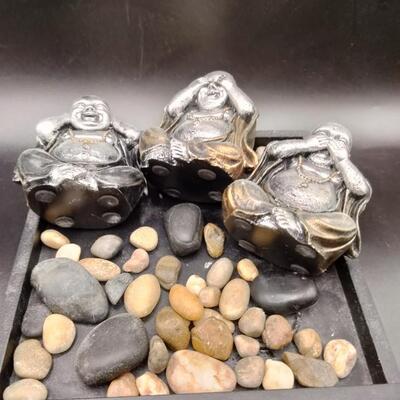 16 - 3 buddha figurines in tray with rocks